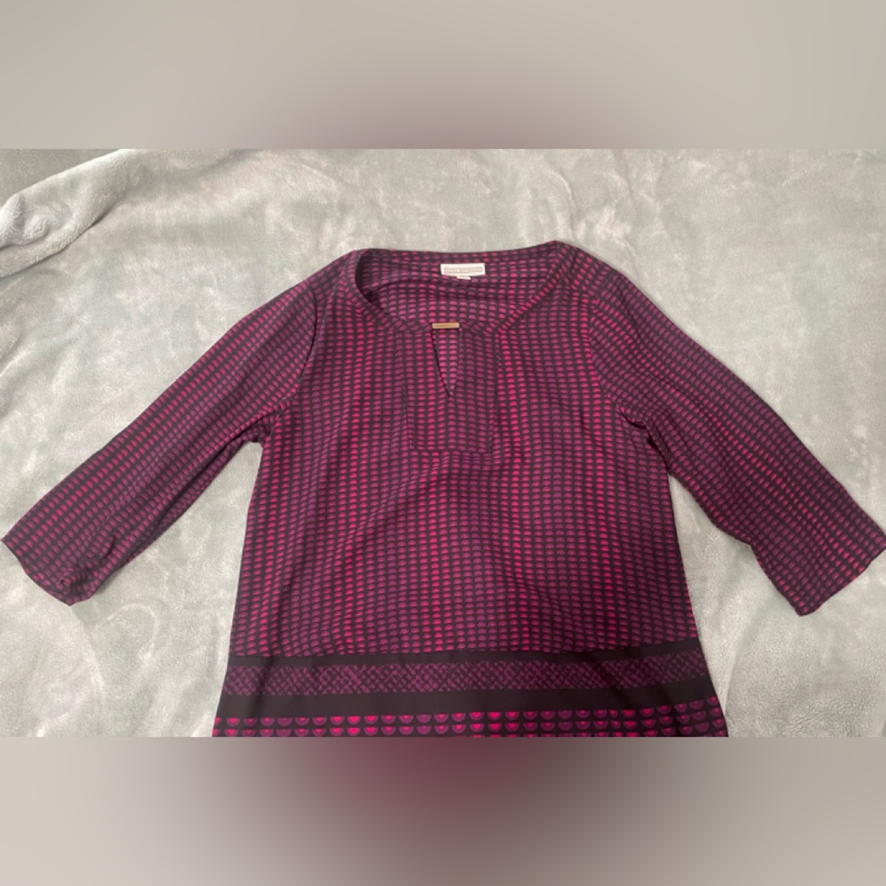 Blouse worn for work. Long sleeve.